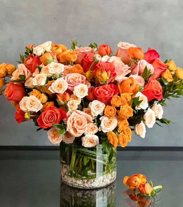 Orange and pink rose arrangement