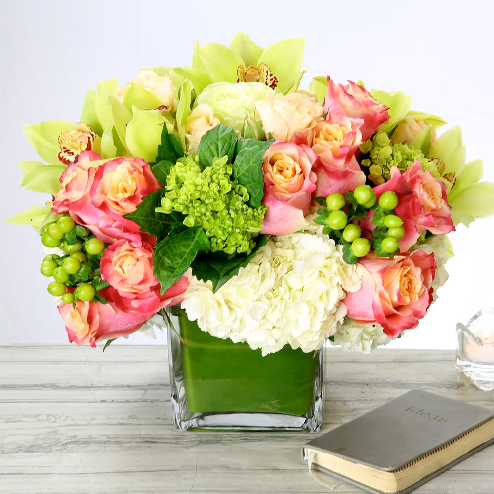 Happiness Blooms Floral Arrangement with Green Hydrangeas, Orange Roses, and Dutch Orchids
Imported Green Hydrangeas and Orange Roses in Happiness Blooms Arrangement
Elegant Happiness Blooms Arrangement for Same-Day Delivery Santa Monica