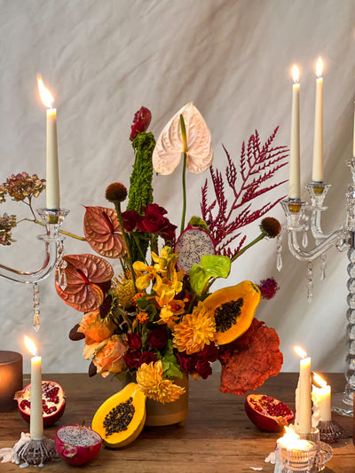 Lush arrangement of amaranths, anthuriums, and vibrant papayas in a white vase – Elegant Blooming Beauty, available for same-day delivery by Santa Monica Florist.