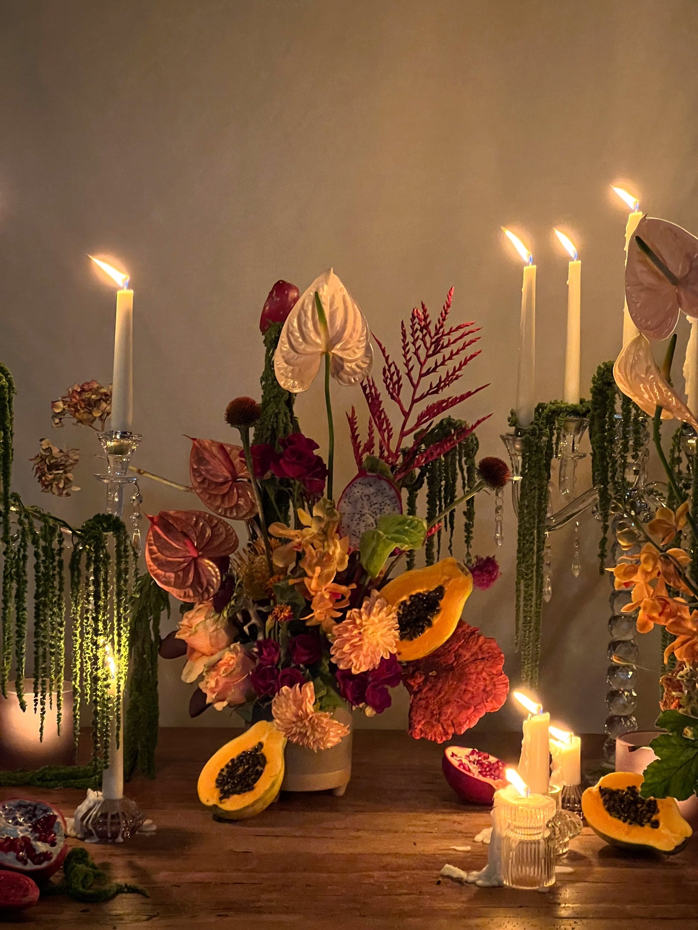 Lush arrangement of amaranths, anthuriums, and vibrant papayas in a white vase – Elegant Blooming Beauty, available for same-day delivery by Santa Monica Florist.