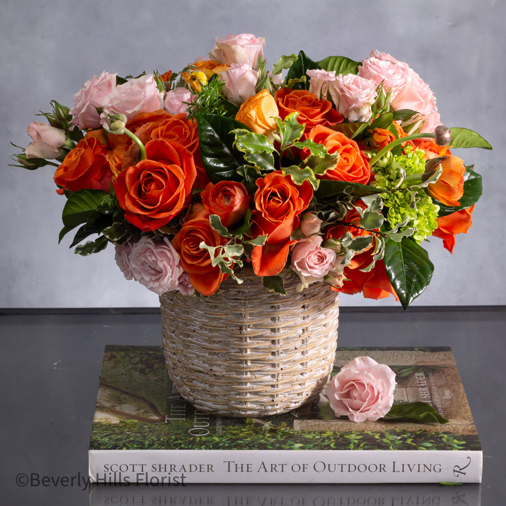 Sunset Serenade Pink Spray Roses in Ceramic Basket Arrangement
Elegant Pink Roses Arrangement in Basket for Same-Day Delivery Santa Monica
Charming Orange and Pink Flower Arrangement for Los Angeles Delivery