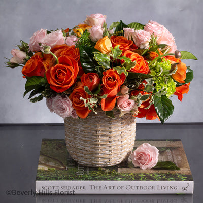 Sunset Serenade Pink Spray Roses in Ceramic Basket Arrangement
Elegant Pink Roses Arrangement in Basket for Same-Day Delivery Santa Monica
Charming Orange and Pink Flower Arrangement for Los Angeles Delivery