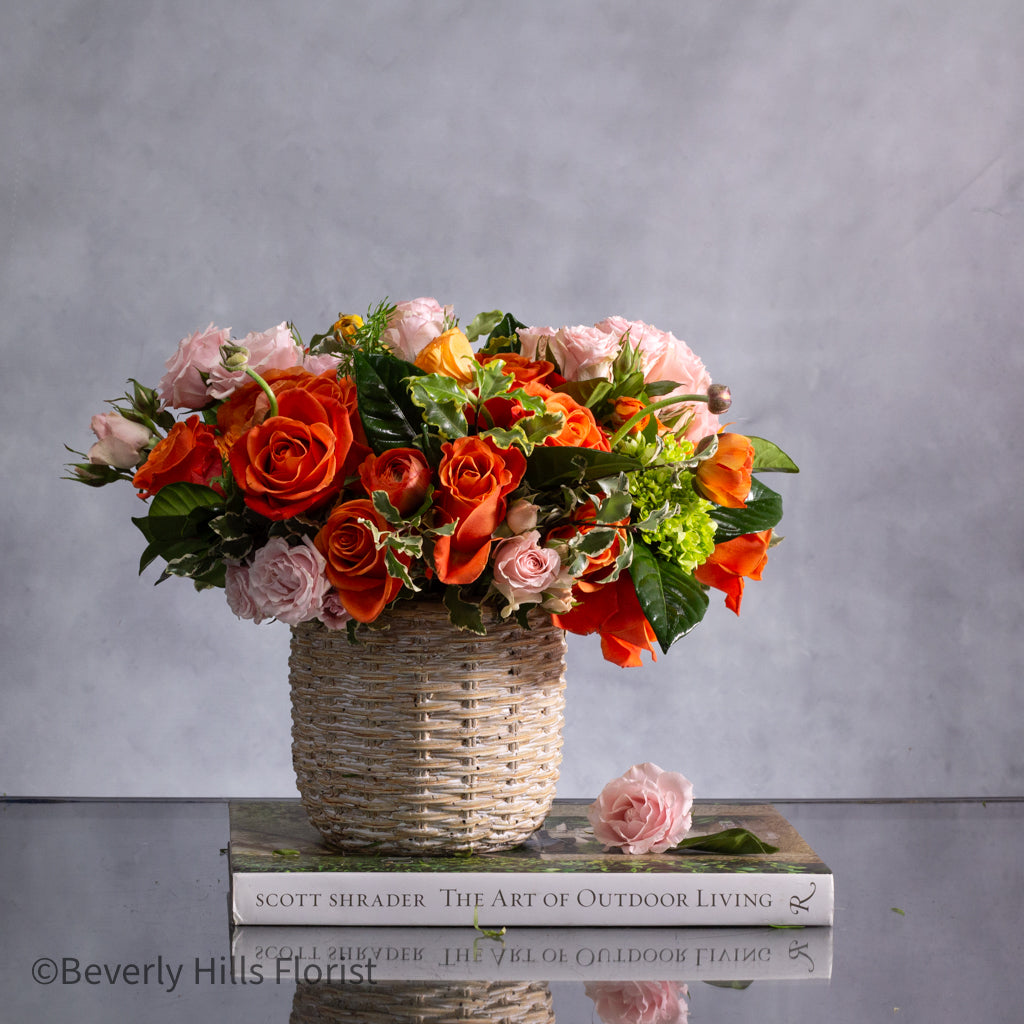 Sunset Serenade Pink Spray Roses in Ceramic Basket Arrangement
Elegant Pink Roses Arrangement in Basket for Same-Day Delivery Santa Monica
Charming Orange and Pink Flower Arrangement for Los Angeles Delivery