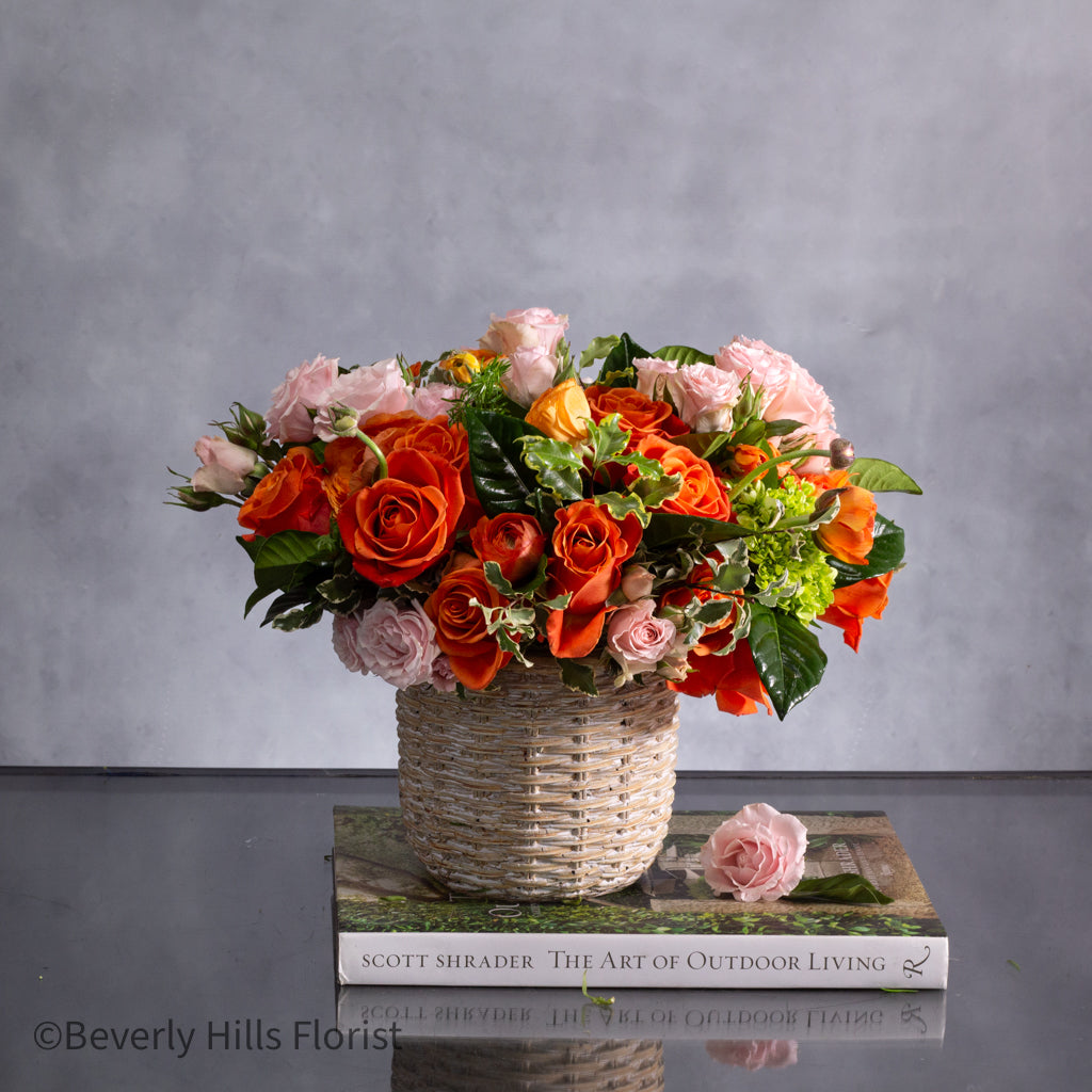 Sunset Serenade Pink Spray Roses in Ceramic Basket Arrangement
Elegant Pink Roses Arrangement in Basket for Same-Day Delivery Santa Monica
Charming Orange and Pink Flower Arrangement for Los Angeles Delivery