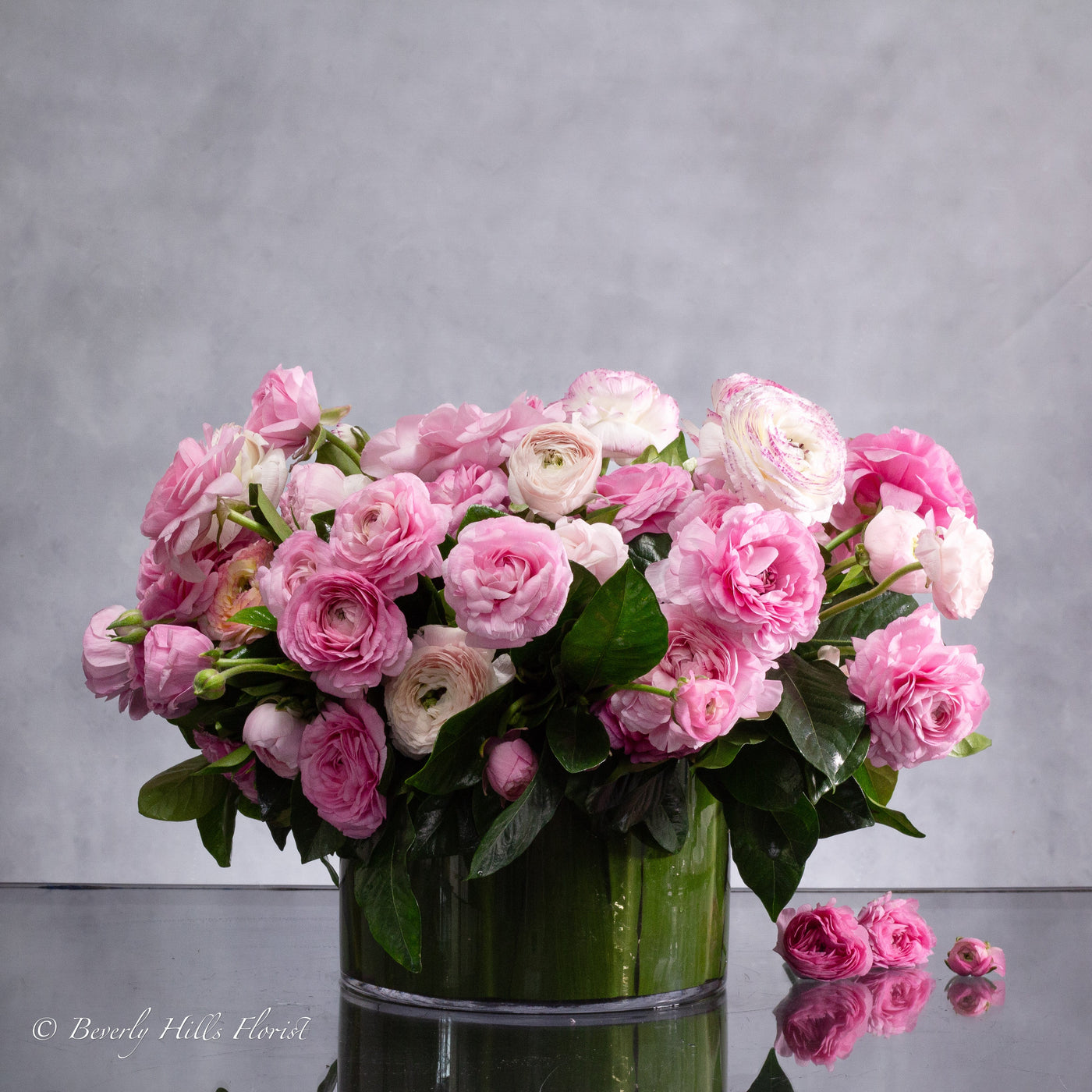 Modern Romance: Pink Ranunculus in a Cylinder of Grace - santamonicaflorist