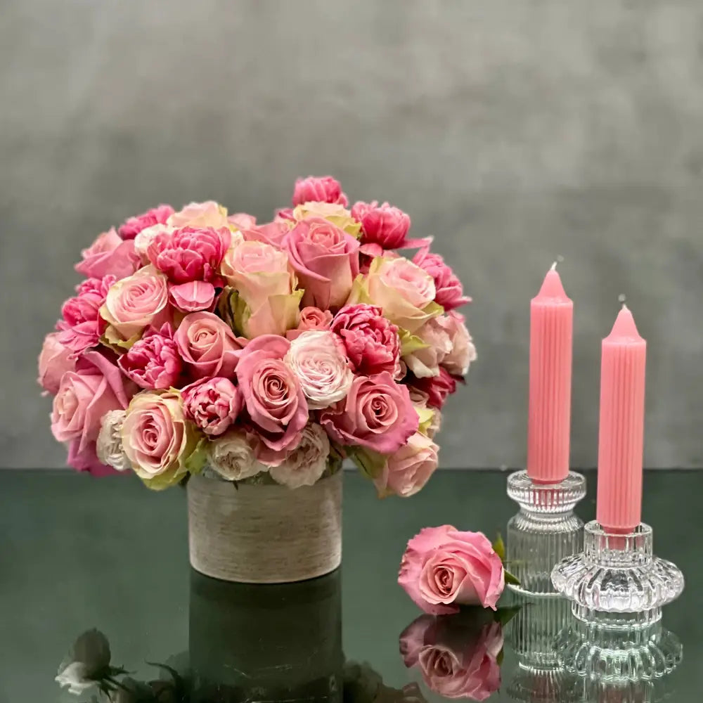 Amour arrangement with pink roses and tulips in a silver-textured vase, perfect for love and romance, available for same-day delivery by LA Orchidia.