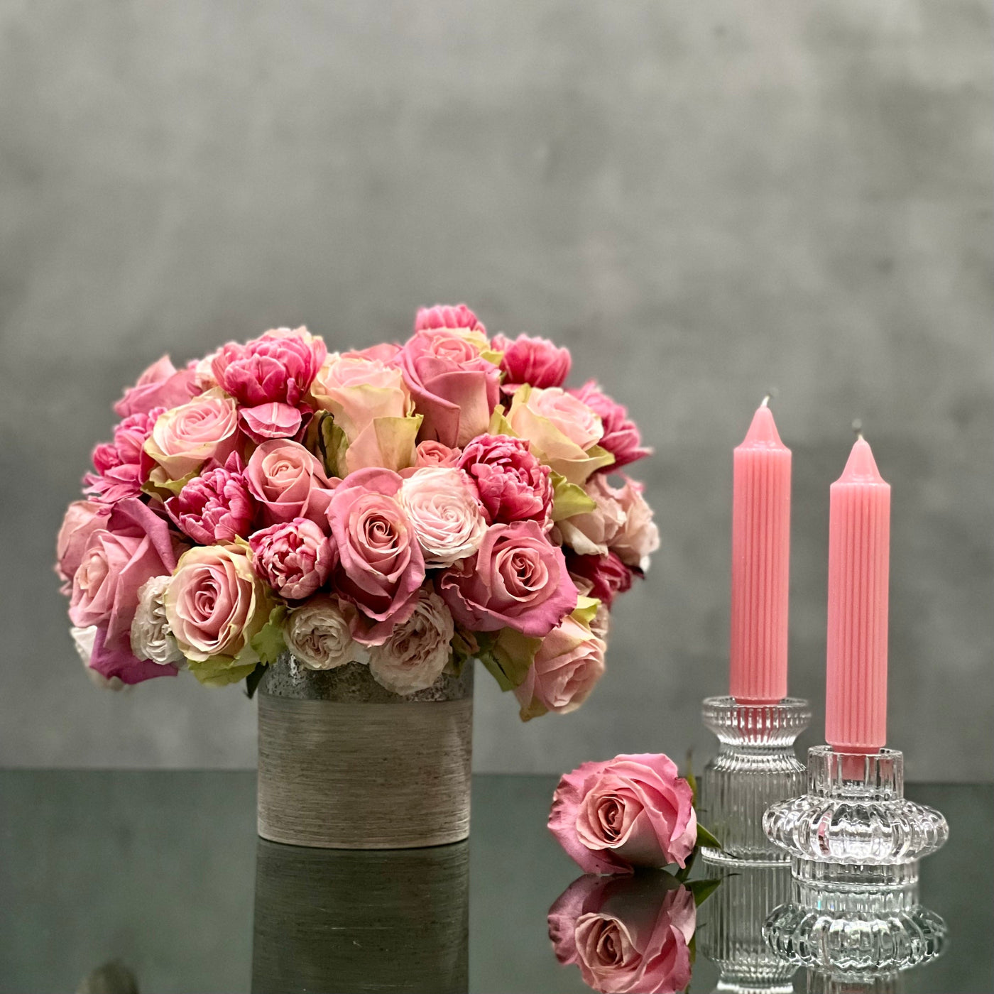 Amour arrangement with pink roses and tulips in a silver-textured vase, perfect for love and romance, available for same-day delivery by Santa Monica Florist.