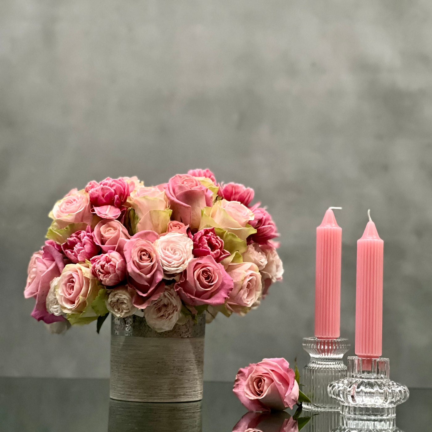 Amour arrangement with pink roses and tulips in a silver-textured vase, perfect for love and romance, available for same-day delivery by Santa Monica Florist.