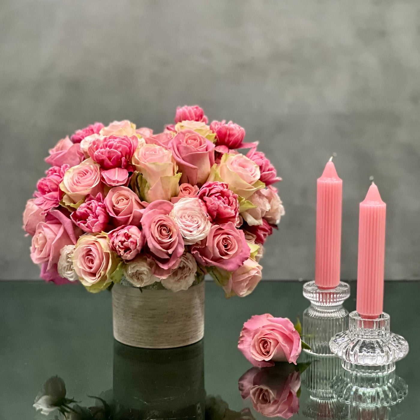 Amour arrangement with pink roses and tulips in a silver-textured vase, perfect for love and romance, available for same-day delivery by Santa Monica Florist.