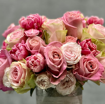 Amour arrangement with pink roses and tulips in a silver-textured vase, perfect for love and romance, available for same-day delivery by Santa Monica Florist.