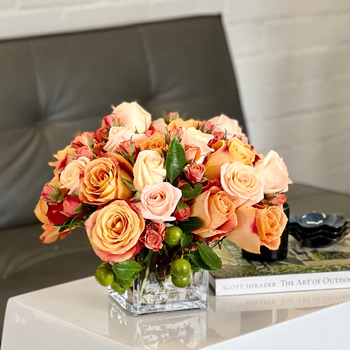 Blooms of Sunshine arrangement with fresh orange flowers, designed for vibrant decor, available for same-day delivery by Santa Monica Florist.