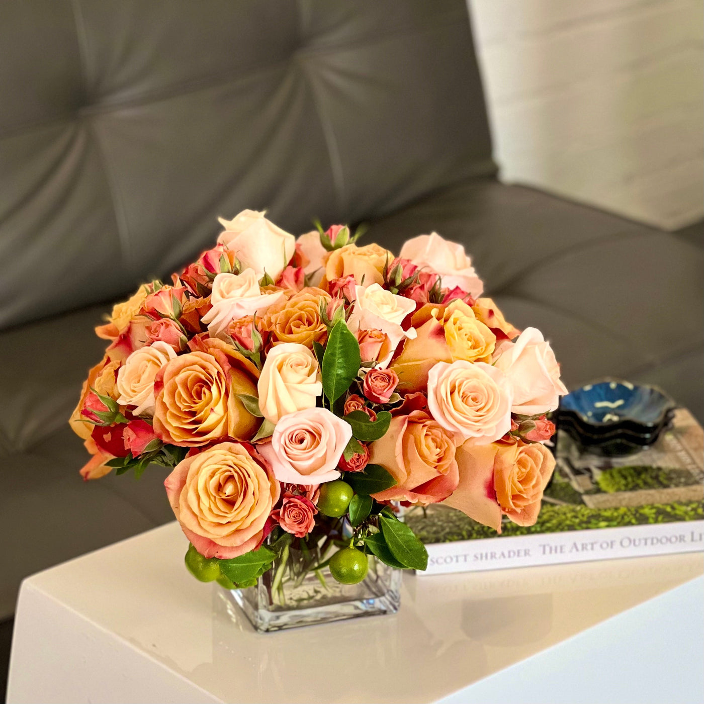 Blooms of Sunshine arrangement with fresh orange flowers, designed for vibrant decor, available for same-day delivery by Santa Monica Florist.