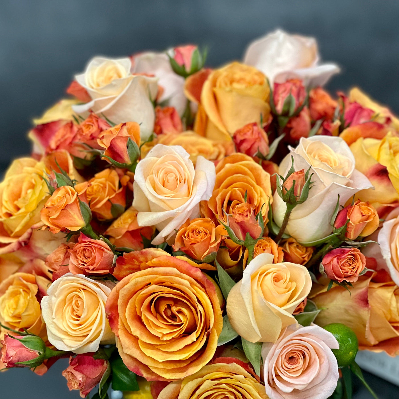 Blooms of Sunshine arrangement with fresh orange flowers, designed for vibrant decor, available for same-day delivery by Santa Monica Florist.