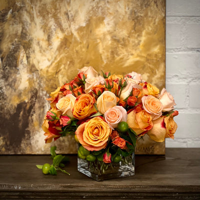 Blooms of Sunshine arrangement with fresh orange flowers, designed for vibrant decor, available for same-day delivery by Santa Monica Florist.