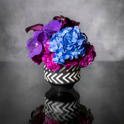 Blue Moonlight arrangement with blue, purple, and pink specialty flowers, available for same-day delivery by Santa Monica Florist.