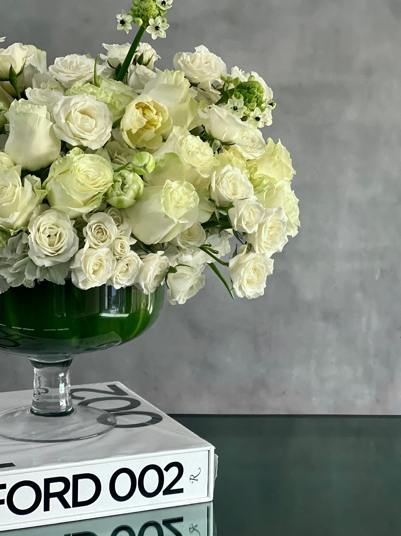 Capture The Heart arrangement with white roses and seasonal flowers in a pedestal vase, available for same-day delivery by Santa Monica Florist.