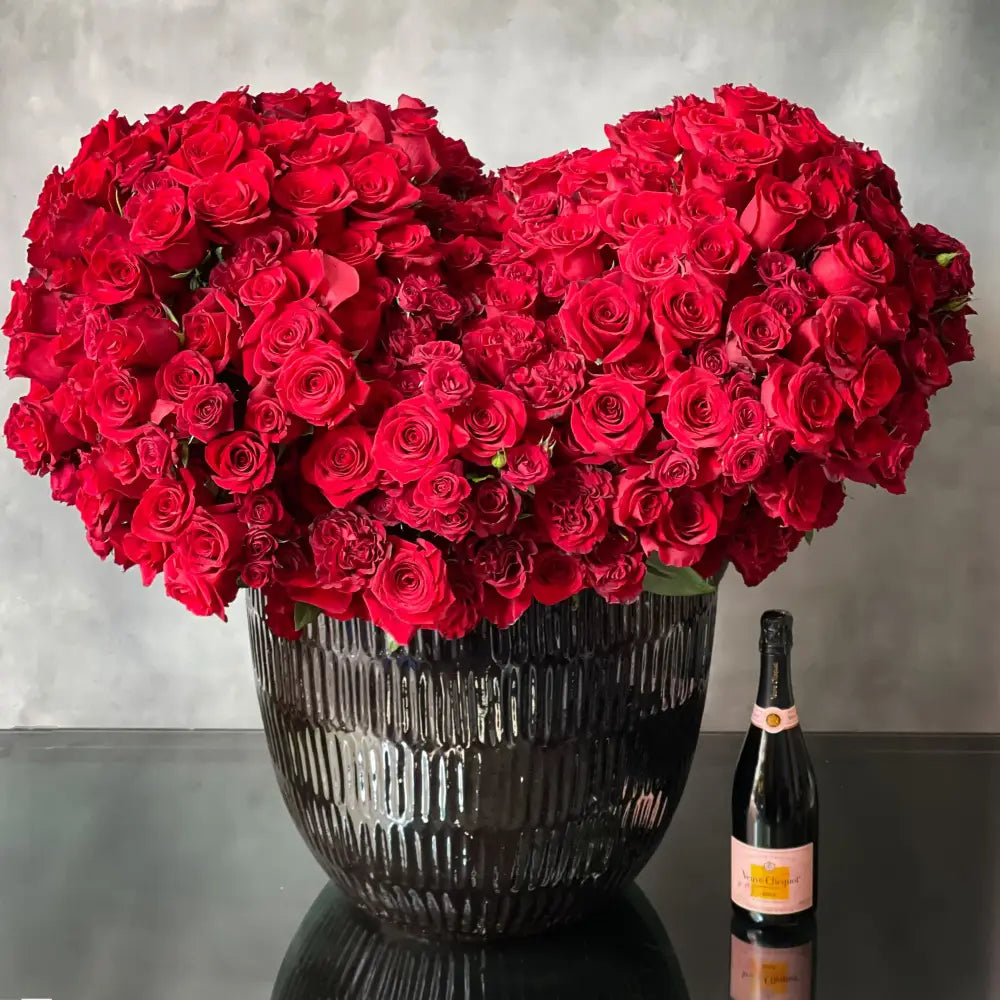Layers and Layers of Love arrangement with over 1,001 red roses, standing 3 feet tall and 4 feet wide, available for same-day delivery by LA Orchidia.