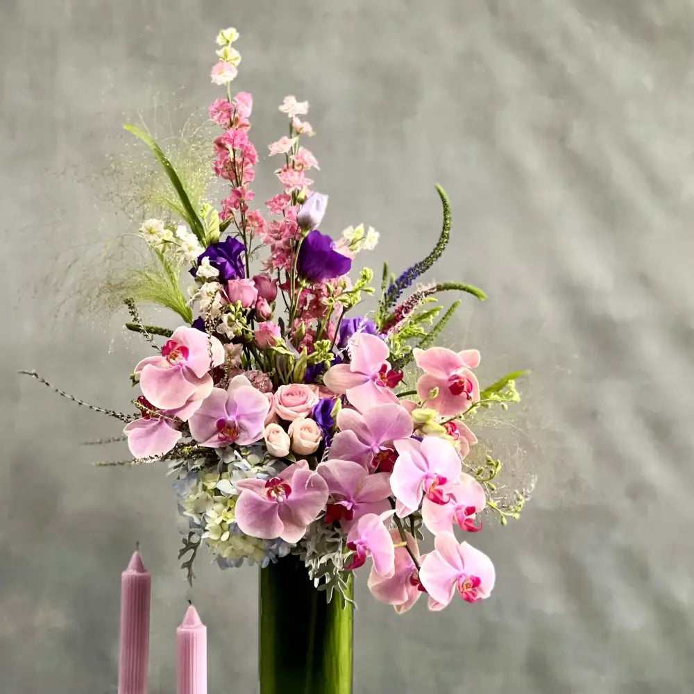 LA Orchidia presents same day delivery for our "Liberty" arrangement. Our team has put together a beautiful land vast floral piece that includes various flowers. These flowers are Hydrangeas, Orchids, Dusty Miller and more. Beautifully pieced for a Birthday, Thinking of You, Thank you, Love and Romance and more.