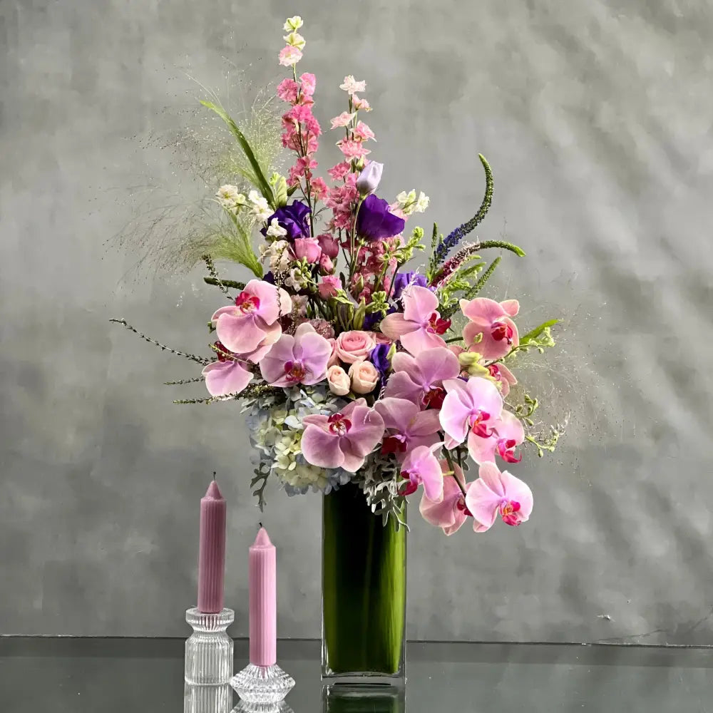 LA Orchidia presents same day delivery for our "Liberty" arrangement. Our team has put together a beautiful land vast floral piece that includes various flowers. These flowers are Hydrangeas, Orchids, Dusty Miller and more. Beautifully pieced for a Birthday, Thinking of You, Thank you, Love and Romance and more.