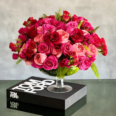 Love arrangement featuring red and hot pink roses in a 15-inch round design, available for same-day delivery by Santa Monica Florist.