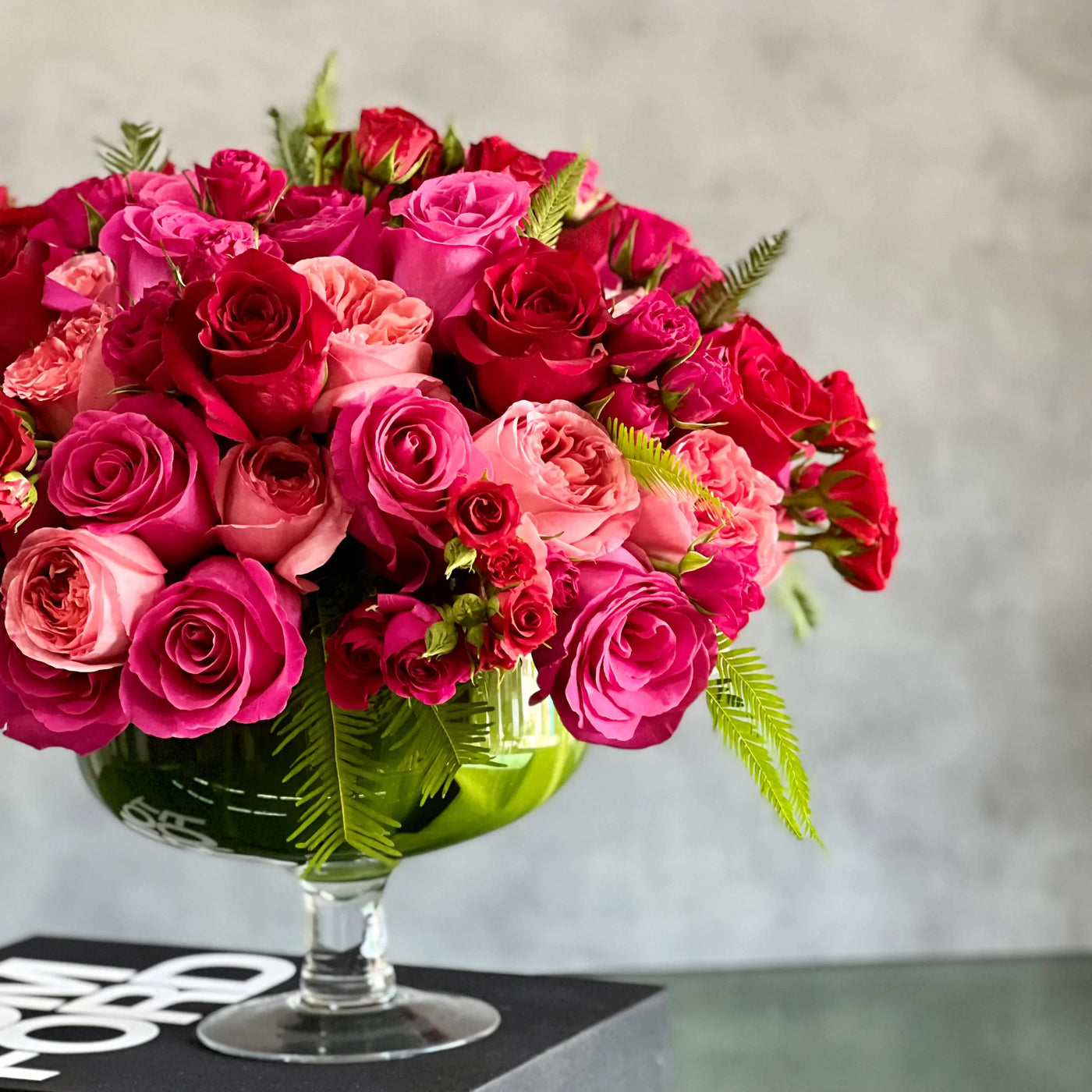 Love arrangement featuring red and hot pink roses in a 15-inch round design, available for same-day delivery by Santa Monica Florist.