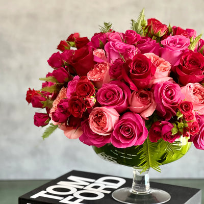 Love arrangement featuring red and hot pink roses in a 15-inch round design, available for same-day delivery by Santa Monica Florist.