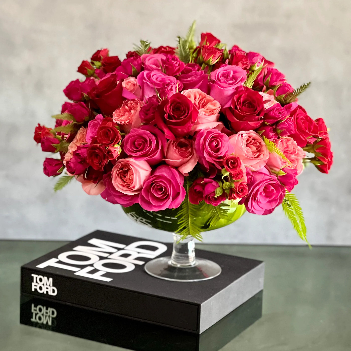 Love arrangement featuring red and hot pink roses in a 15-inch round design, available for same-day delivery by Santa Monica Florist.