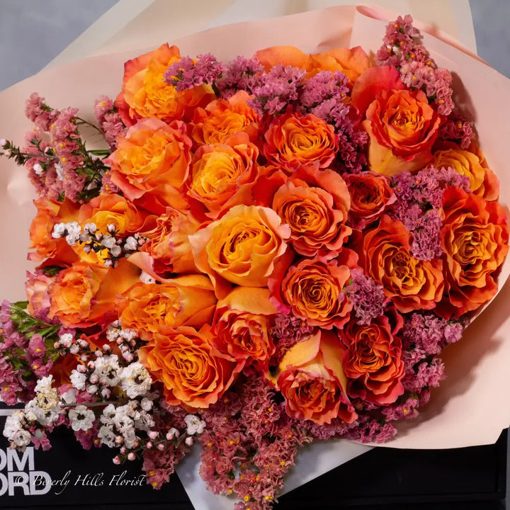 Orange Two-Tone Fragrant Rose Hand Bouquet with vibrant orange hues and delicate fragrance for same-day delivery in Los Angeles.