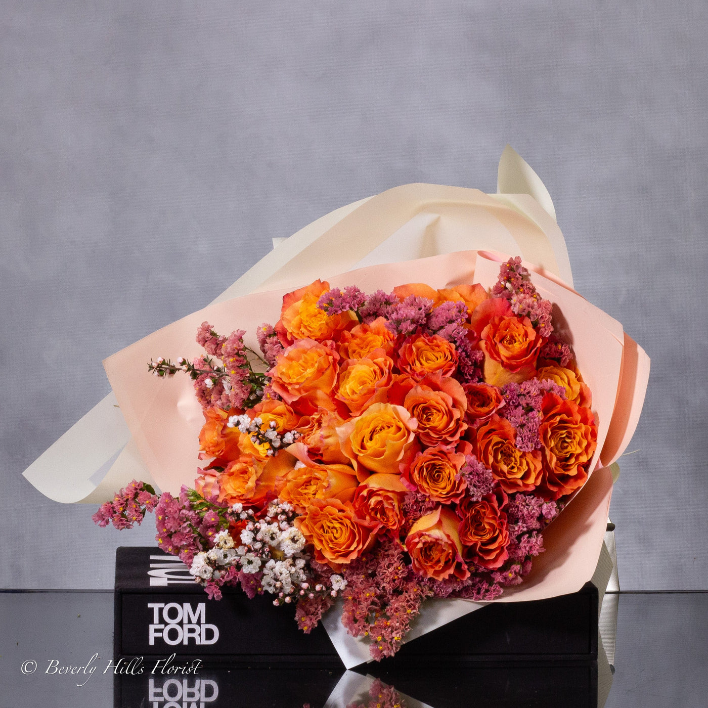 Orange Two-Tone Fragrant Rose Hand Bouquet with vibrant orange hues and delicate fragrance for same-day delivery in Santa Monica.