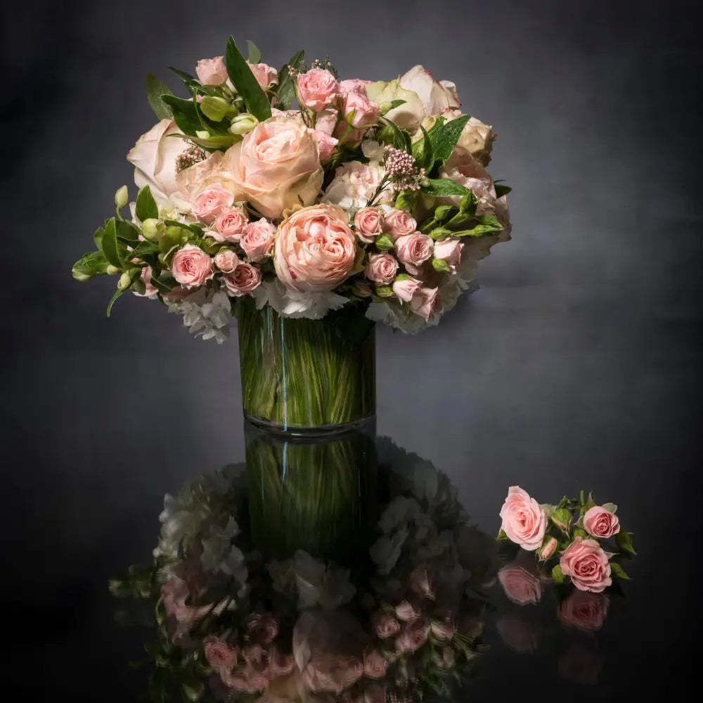 LA Orchidia offers same day delivery. Includes pink Roses, pink Spray Roses, Seasonal greens and white Hydrangeas. Birthday flowers, Thinking of you flowers, Congratulations flowers, Thank you flowers, welcome flowers.  