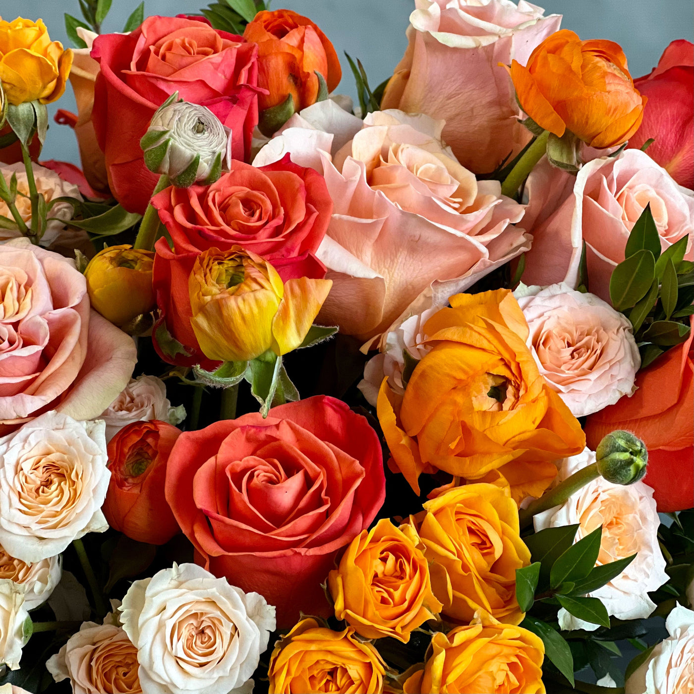 Peachy Sunset Floral Arrangement with Orange Roses and Peach Spray Roses
Elegant Ranunculus and Rose Arrangement in Glass Vase
Luxury Floral Arrangement for Same-Day Delivery Santa Monica
Peachy Sunset Flower Arrangement for Los Angeles Delivery