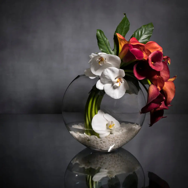 My LA Orchidia presents same day delivery for our arrangement with an assortment of seasonal florals, greens and orchids in a glass vase. Perfect for birthdays, welcomes and office decor. 