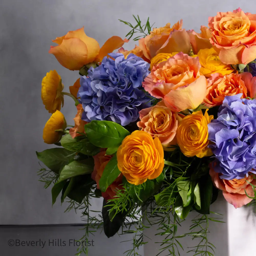 The Tale of Orange Roses and blue hydrangeas alt 4