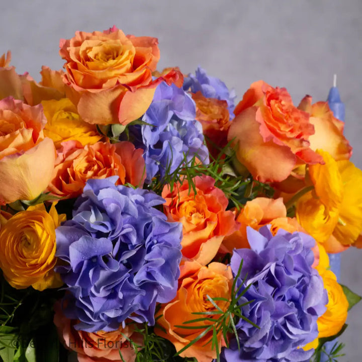 The Tale of Orange Roses and blue hydrangeas alt 2