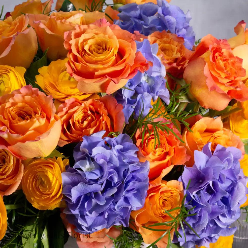The Tale of Orange Roses and blue hydrangeas alt 3